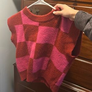 checked pink and red sweater